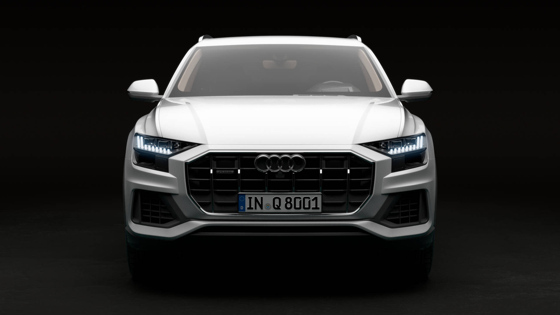 Green Audi Q8 product shot front view.