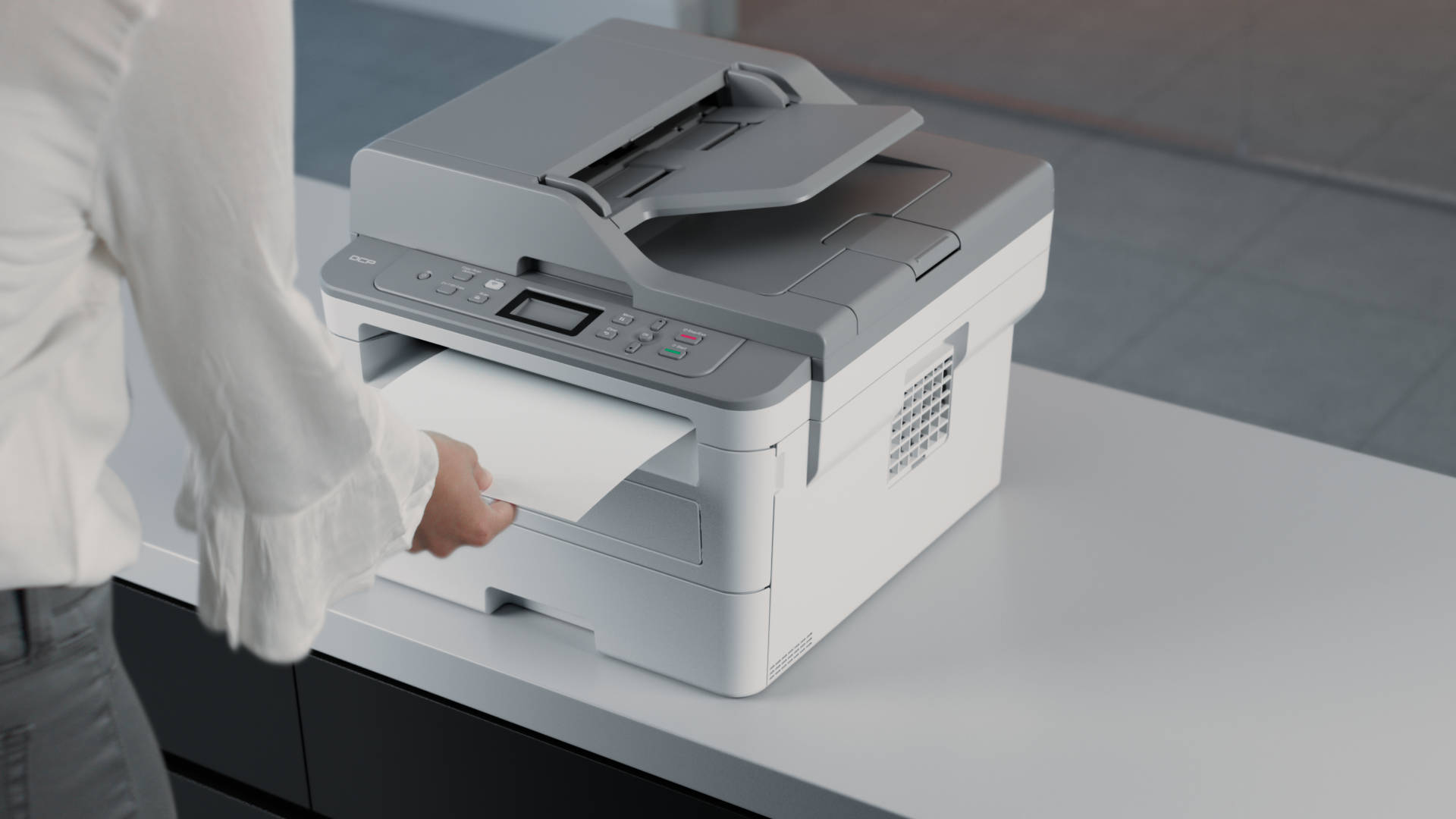 Composite of live footage of a person interacting with a CG printer.